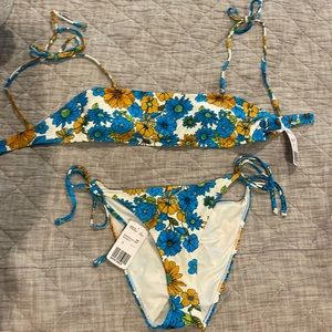 Floral bikini. NWT. Forever 21. Top Medium, bottoms Large.